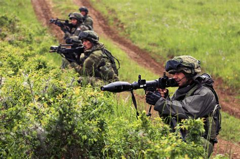 Croatian soldiers engage opposing forces during exercise Combined Resolve IV at the U.S. Army’s ...