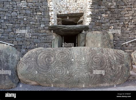 Entrance stone with megalithic art. Newgrange prehistoric monument ...