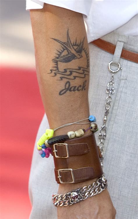 How many tattoos does Johnny Depp have? | The US Sun