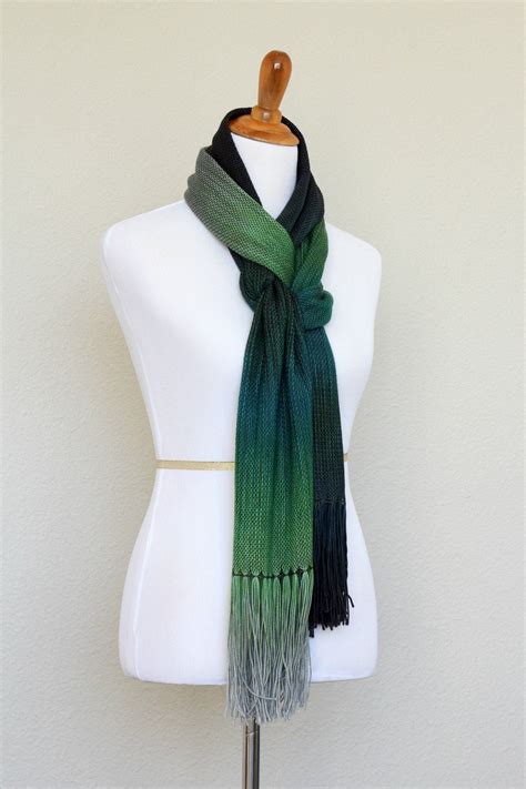 Hand woven scarf with gradually changing colors from green to silver grey. Amazing color shades ...