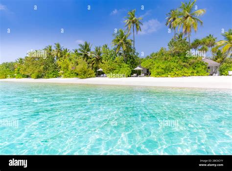 Luxury vacation, summer vibes. Tranquil beach scene. Exotic tropical ...