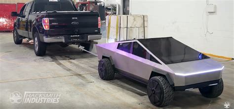 Tesla Cybertruck Mini takes out full-sized Ford F-150 in tug-of-war bout