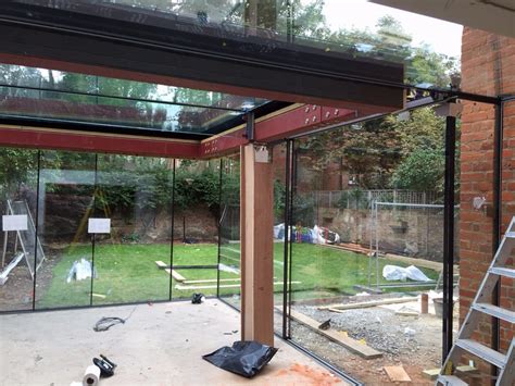 Structural glass and balanced cantilever steel extension | StructureMode