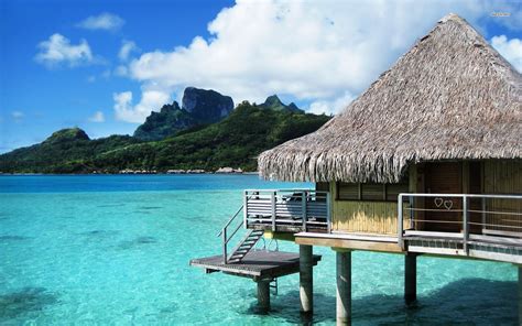 Small traditional house on the water-Bora Bora Tahiti Island