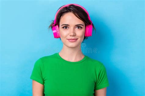 Photo of Positive Pretty Woman Dressed Green Top Enjoying Music ...