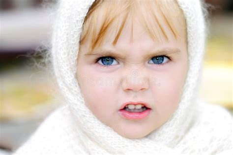 The Little Girl With An Angry Face Stock Photo - Image of mood, game: 22279030