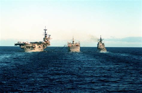 The US Navy (USN) Ticonderoga Class Guided Missile Cruiser USS HUE CITY (CG 66) transits into ...