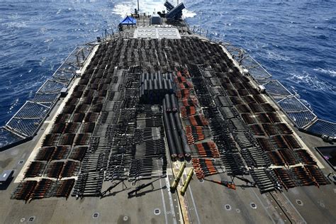 US Navy seizes small boat carrying thousands of weapons in Arabian Sea