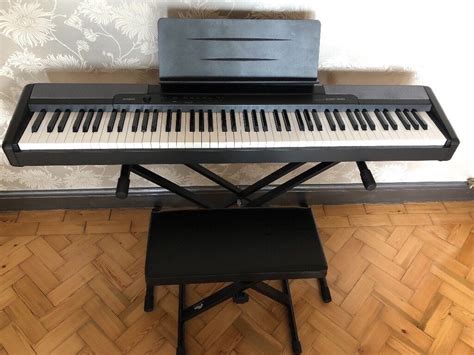 A fantastic Casio CDP-100 electric keyboard, stand & stool | in Maindy, Cardiff | Gumtree