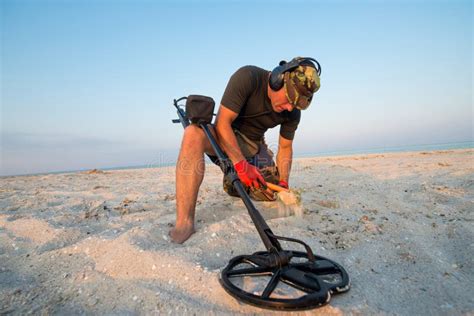 Man with a Metal Detector on a Sea Sandy Beach Stock Image - Image of ...