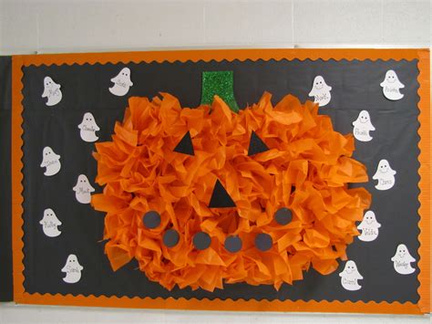 teachingtimes2.blogspot.com made this pumpkin from tissue paper for her Halloween bulletin board ...