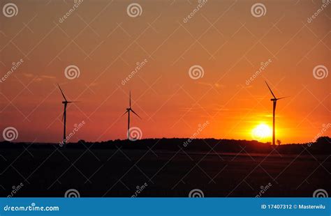 Wind turbine during sunset stock photo. Image of renewable - 17407312