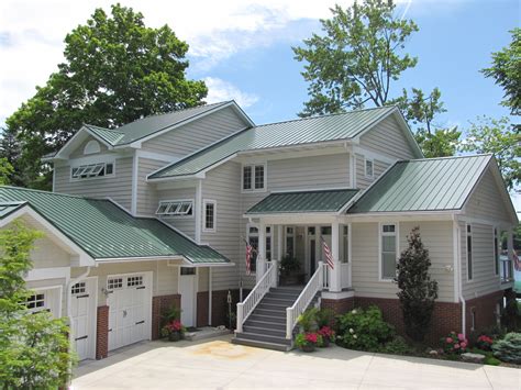 Steel Roof. Metal provided by Coated Metals Group in Classic Green. www.cmgmetals.com Project ...