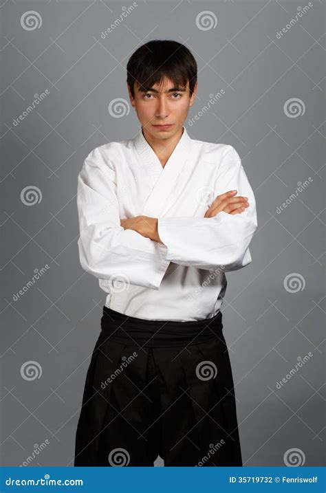 Young Man in Aikido Uniform in Serious Pose Stock Photo - Image of human, front: 35719732