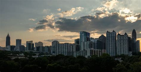 Atlanta Skyline during Sunset Stock Photo - Image of airplane, green ...