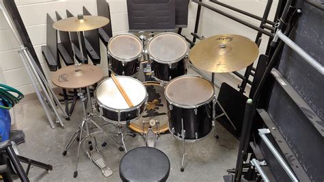 My school had me setup this drum kit for them. It looks and sounds like $50. (Yamaha kit and ...