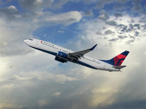 Delta Boeing 737 Taking Off Photograph by Erik Simonsen - Pixels Merch