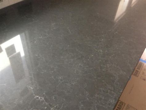 I am considering using Caesarstone Piatra Grey (5003) on my perimiter countertops. I ordered a ...