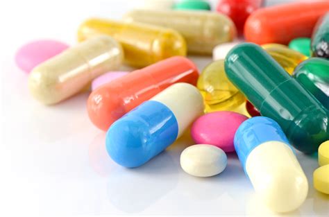 Colorful of oral medications on White Background. - A-one (A1) Moving Company | Movers | Annapolis