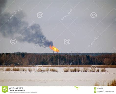 Burning gas flare stock photo. Image of fire, danger - 65248604