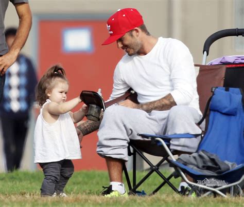 Sept. 22nd - LA - David and Harper watching the boys play soccer ...