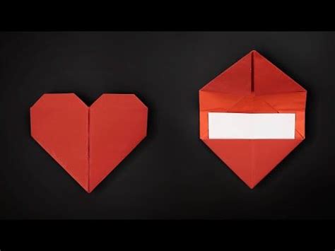 an origami heart and a red envelope