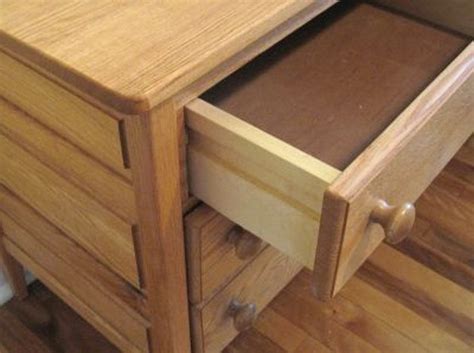 How to Remove Drawers With Plastic Stops | Hunker