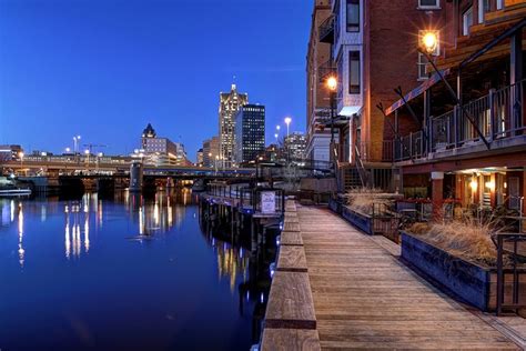 Milwaukee's Riverwalk. Photo by John December | Milwaukee riverwalk, Wisconsin travel, Milwaukee wi