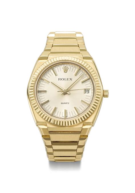 Rolex. An extremely rare and heavy 18K gold tonneau-shaped wristwatch with sweep centre seconds ...