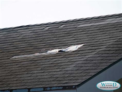 Wind Damage to Asphalt Shingles: Common Misconceptions - Winfield Builders