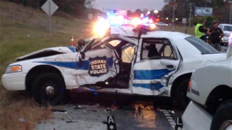 Indiana state trooper trapped after semi crashes into police car - ABC7 ...