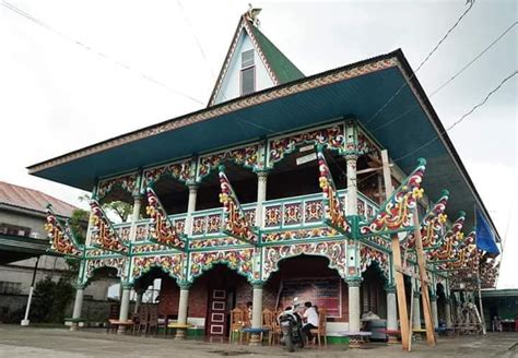 Proud Maranao - Torogan, is a traditional house built by...