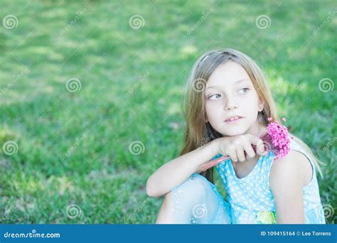 Smiling Little Girl Outdoor Stock Photo - Image of dream, baby: 109415164