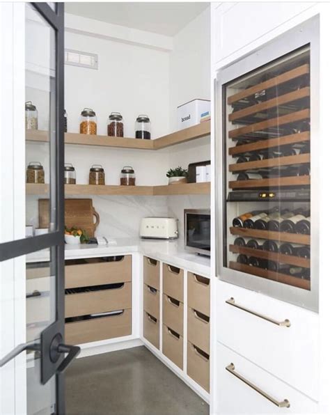 A butler's pantry with a built in beverage fridge is the only way to go! Genius ...#beverage # ...