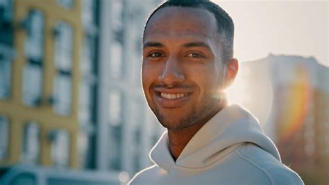 Premium Photo | Closeup male portrait in morning sun rays young ...