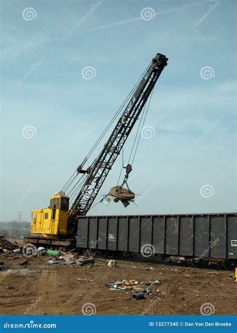 Scrap Yard Crane With Magnet Stock Photo - Image: 13277340