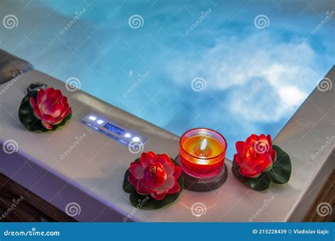 Hot Tub with Candles and Water Lilies Stock Image - Image of interior, pool: 215228439