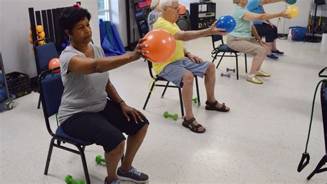 Chair aerobics stands up for fitness