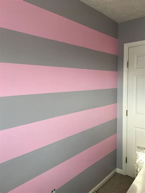 Pink and gray striped wall #greyandpinkbedroomideas #graystripedwalls ...