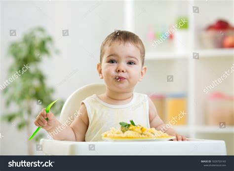 Funny Baby Boy Eating Healthy Food Stock Photo 1029733165 | Shutterstock