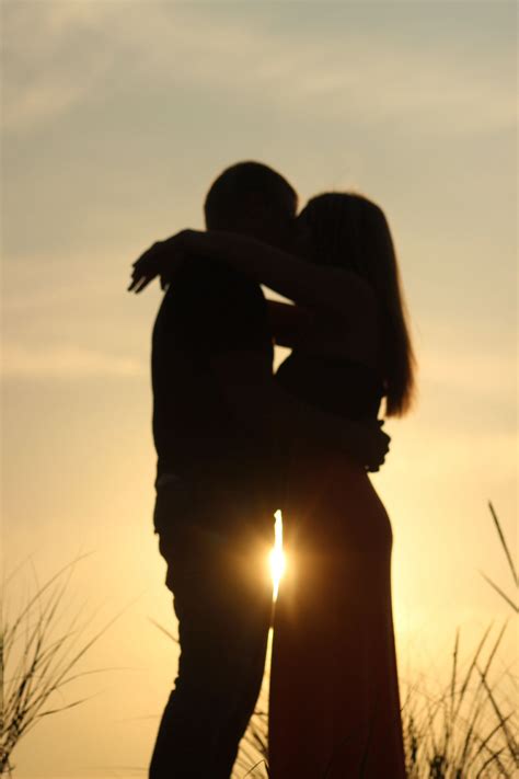 Engagement, love, couple, sun, sunshine, beach, sand, hug, embrace, forever, marriage, ideas ...