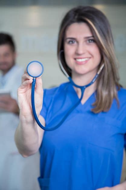 Premium Photo | Happy smiling female doctor with stethoscope