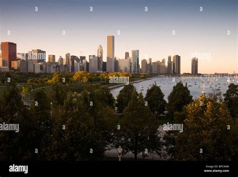 Sunset view of Chicago, the marina and sailboats in Lake Michigan from ...