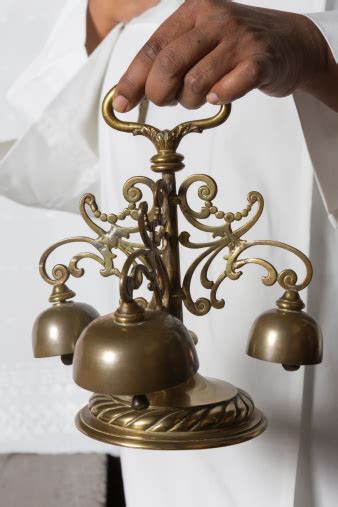 Consecration Bells During Holy Mass Stock Photo - Download Image Now - Antique, Bell ...