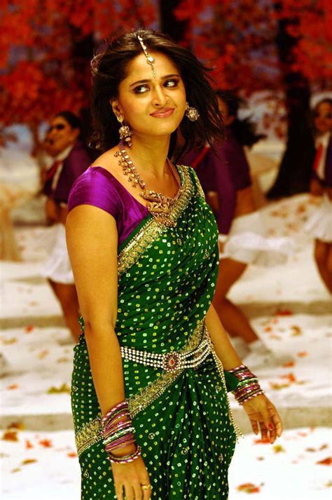 Tollywood Actress Anushka Shetty Hip Navel Show in Green Saree - Anushka Shetty