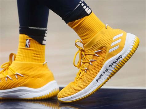 Utah Jazz's Donovan Mitchell makes a statement on his shoes following ...