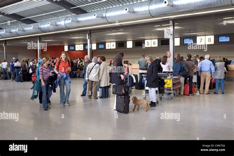 Baden-Baden, travelers in the terminal of the Baden Airpark Stock Photo ...