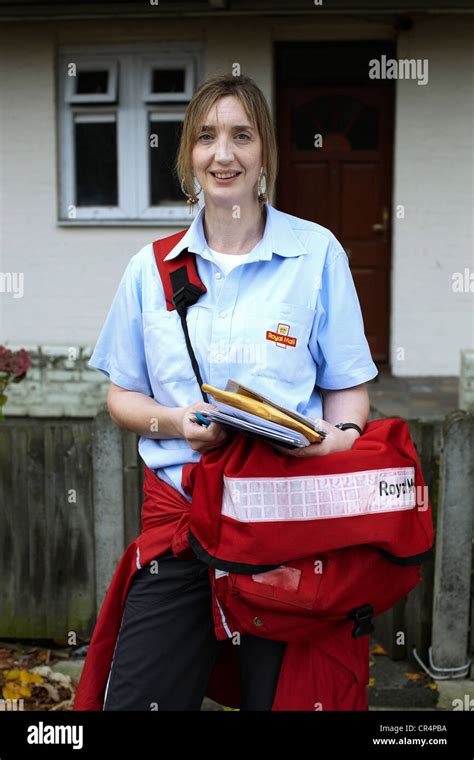 The Great British Postman. Postal worker on the streets of UK Stock ...