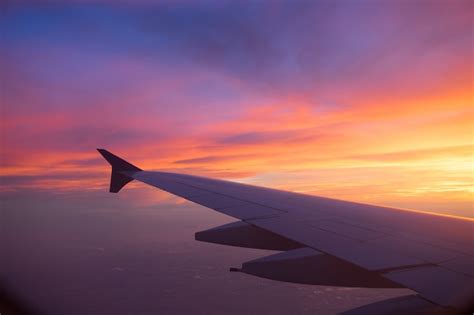 Premium Photo | Sunset sky from the airplane window