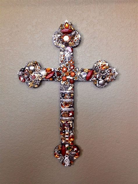 Custom Ordered 16 inch metal cross embellished with personal jewelry. stuckonsteel.com Custom ...